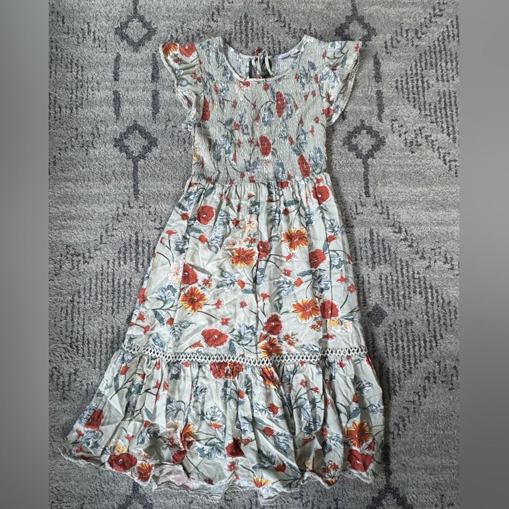 Patrons of Peace Floral Smocked Top